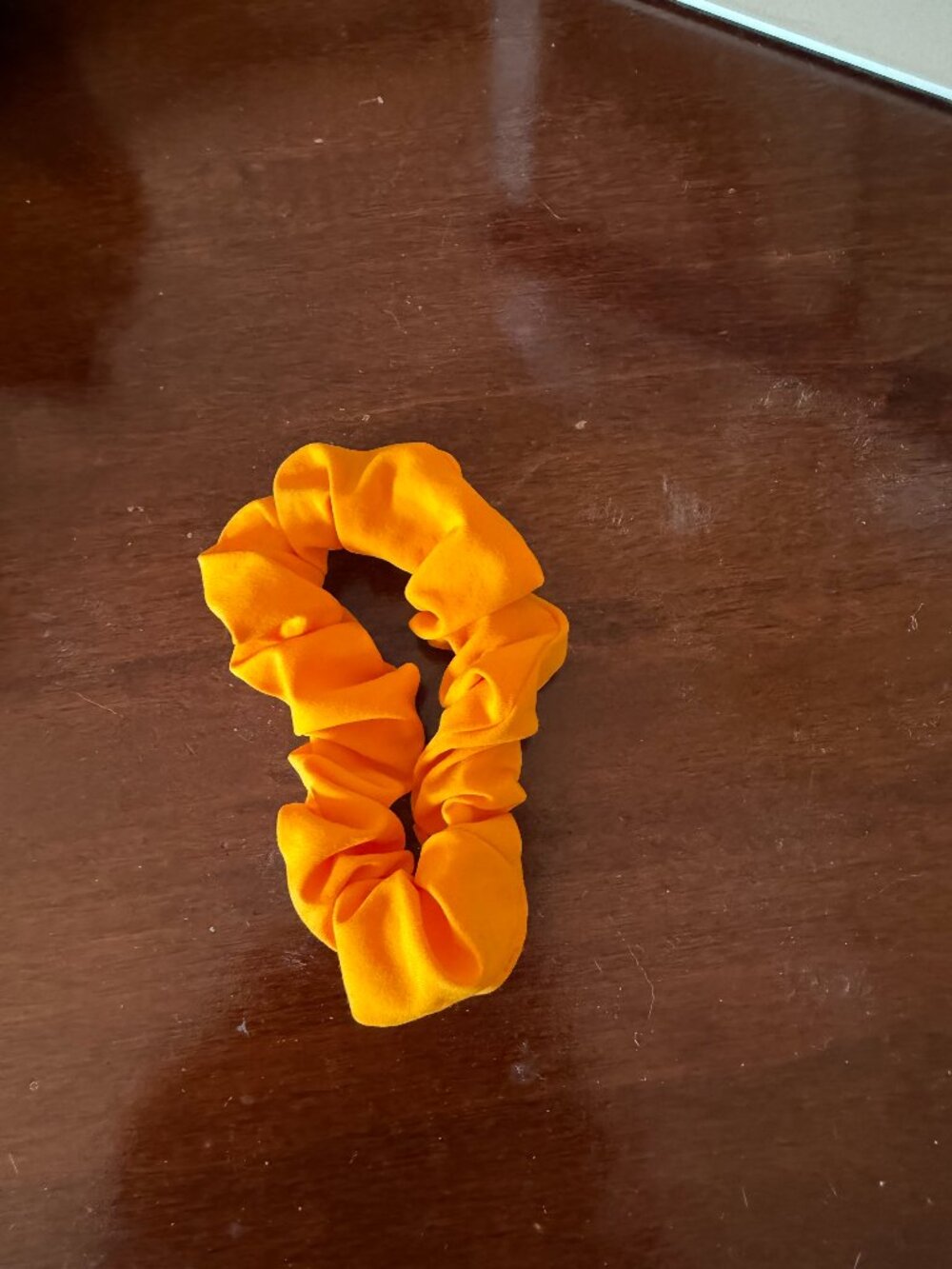 Light Orange Lululemon scrunchie